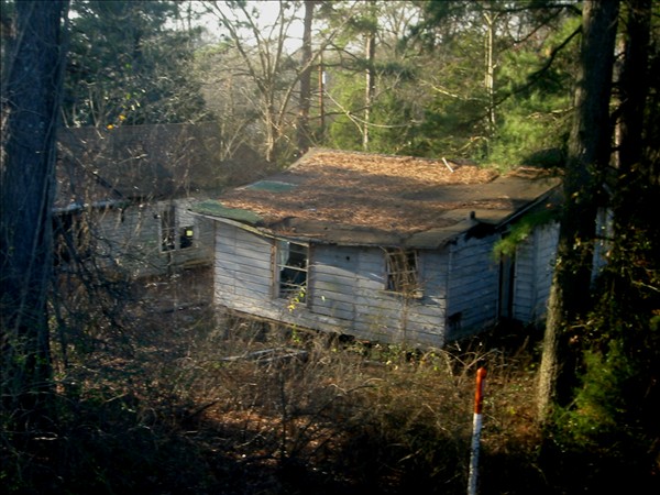 This was part of an abandoned settlement that sat right along the train tracks. Taken somewhere in Arkansas. Shot with my Canon S200.