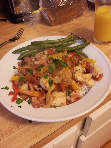 Basque Chicken with green beans in butter and braised garlic glaze..