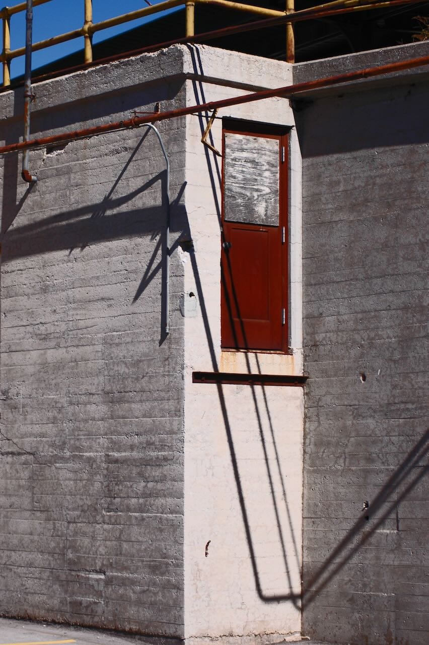 I love long disused doorways. Taken at the Santa-Fe train station in Oklahoma City. Taken with a Nikon D70.