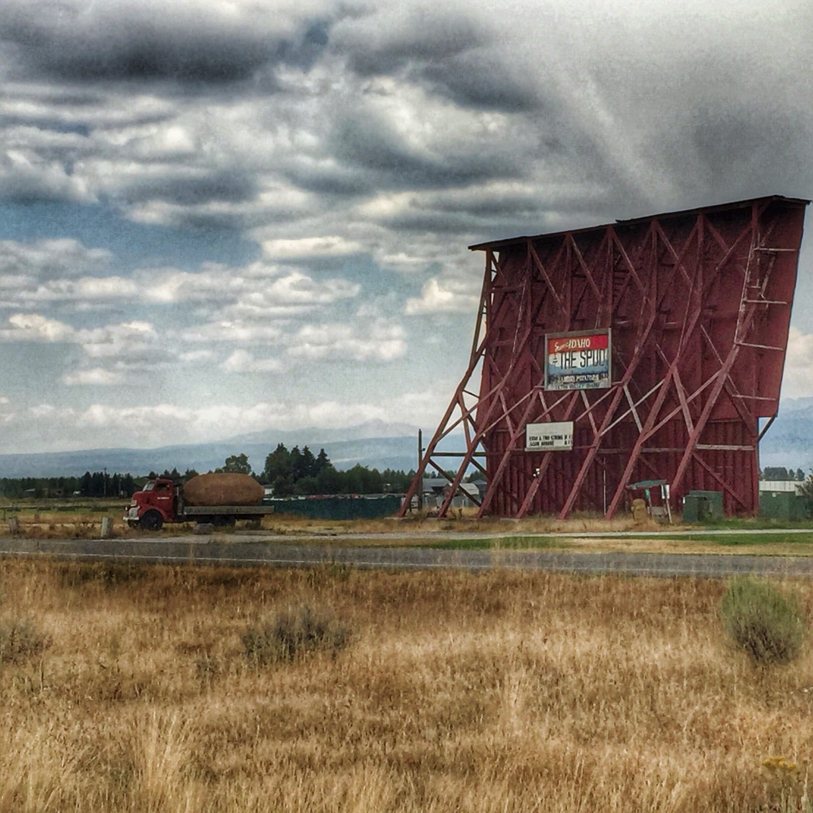 Color photo of the spud drive-in in Driggs Idaho with a giant fake potato on a large truck out front.